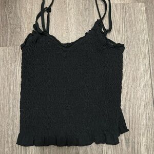 Ruffled black top